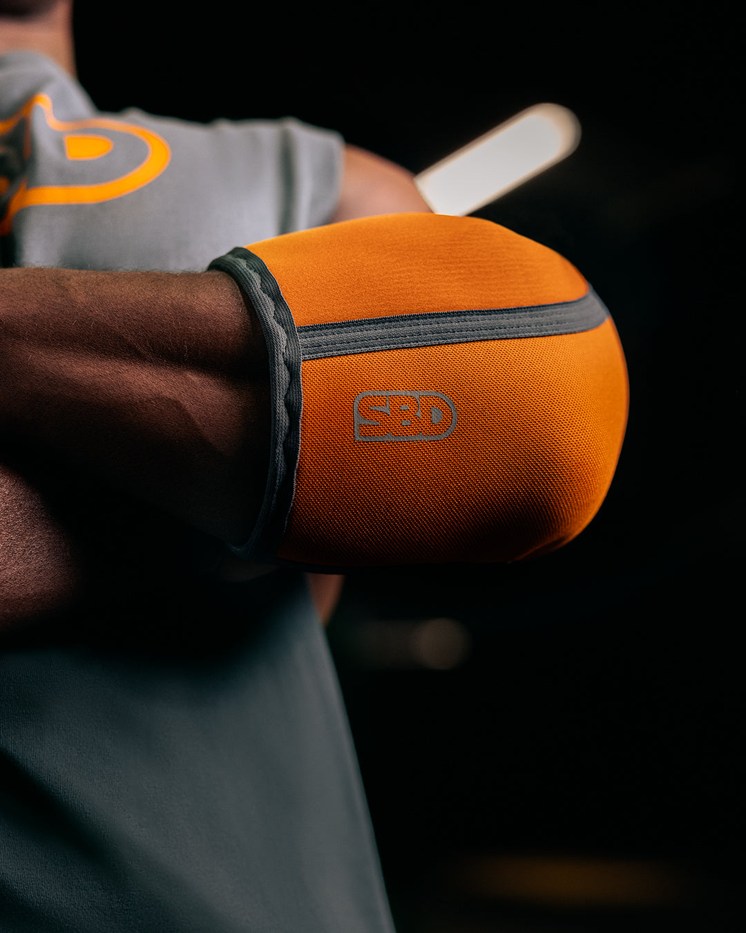 Forge Ellenbogenstulpen Orange